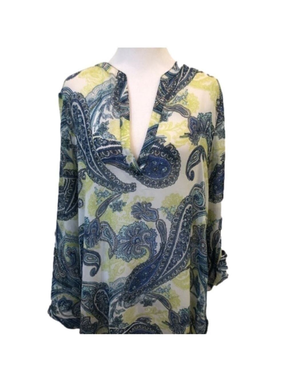 Chico’s Size 1 sheer paisley pull over top. Roll tab sleeves. Hi-lo hem. V-neck